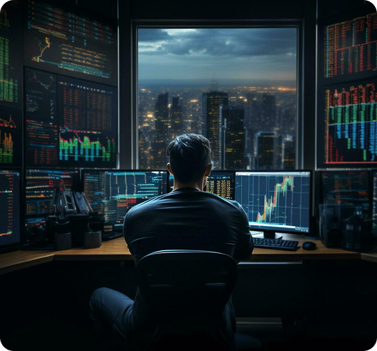 Person vor Trading-Bildschirmen